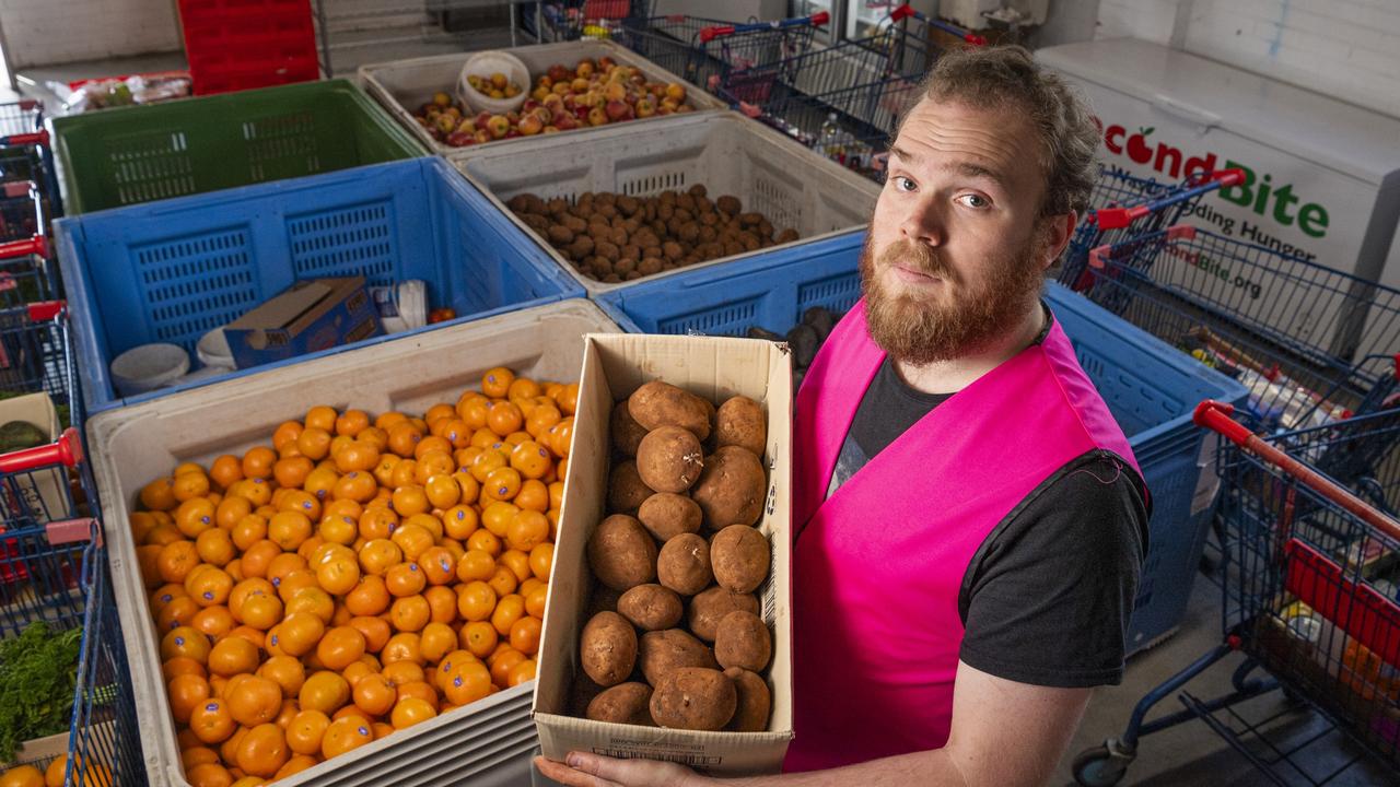 Stewart Limpus collects potatoes for hampers at Loaves and Fishes Care Service, Thursday, July 11, 2024. Picture: Kevin Farmer