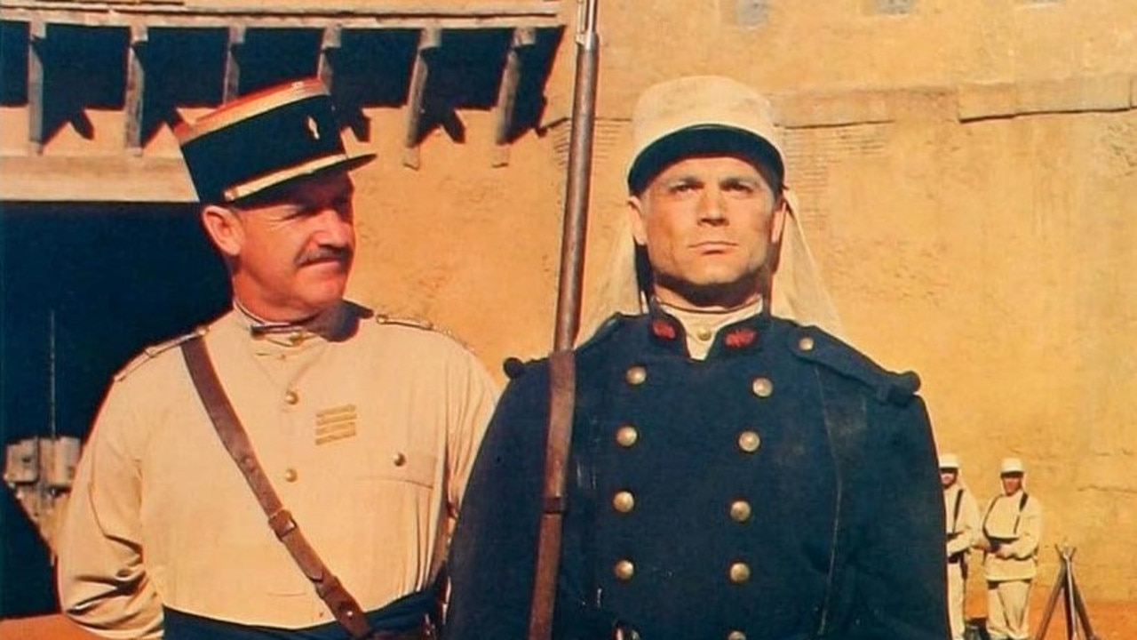 #51: Major William Sherman Foster in March or Die (1977) - Playing a French Legion Major, Hackman's Foster leads a unit protecting an archaeological dig site.