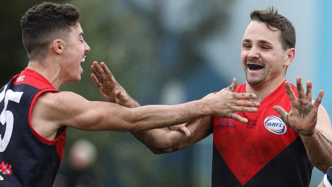 St Albans star Tim Jenkins (right) celebrates a goal in the WRFL. Picture: Local Legends Photography