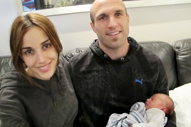 <p>And baby makes three. Oscar Judd with parents Rebecca and Chris. Picture: Judd's</p>