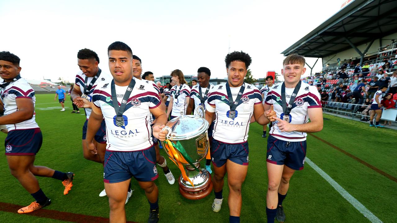 The 2022 Ipswich captain Josiah Pahulu, middle, leads celebrations alongside Tre Fotu (Cronulla) and Tom Luhrman (Roosters). Picture David Clark