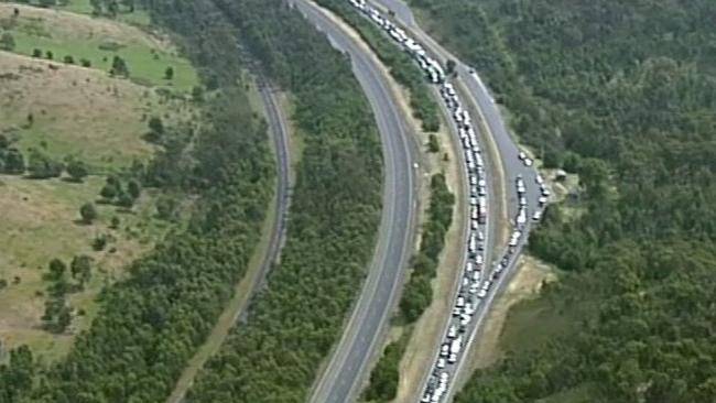 Traffic is banking up on the Hume Freeway after the road was closed in both directions.