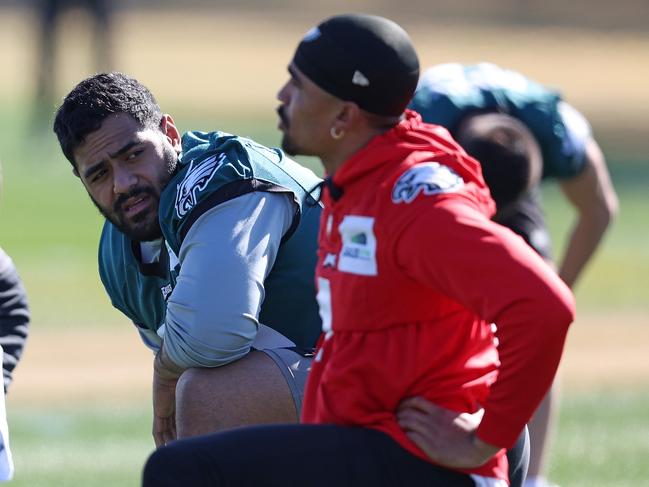 Star Eagles quarterback Jalen Hurts (R) knows he can rust Mailata to have his back. Picture: Getty