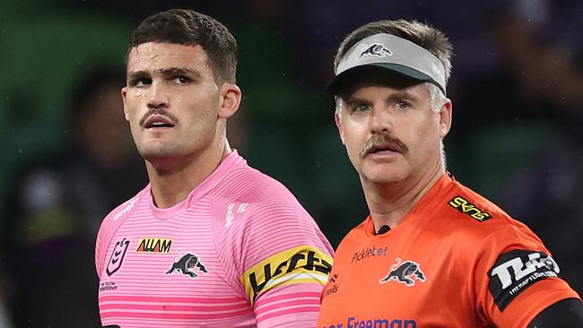 MELBOURNE, AUSTRALIA - MARCH 20: Nathan Cleary of the Panthers is assisted off the field by a trainer for a Head Injury Assessment (HIA) during the round three NRL match between the Melbourne Storm and Penrith Panthers at AAMI Park on March 20, 2025, in Melbourne, Australia. (Photo by Daniel Pockett/Getty Images)