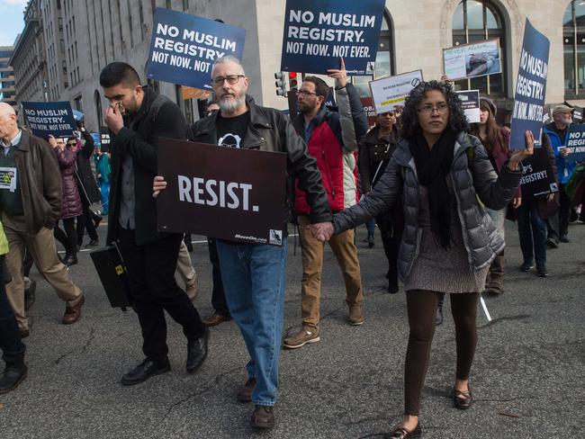 People march in Washington, DC against a possible registration of Muslims in the US by the administration of President-elect Donald Trump on December 12, 2016. Picture: AFP/Nicholad Kamm