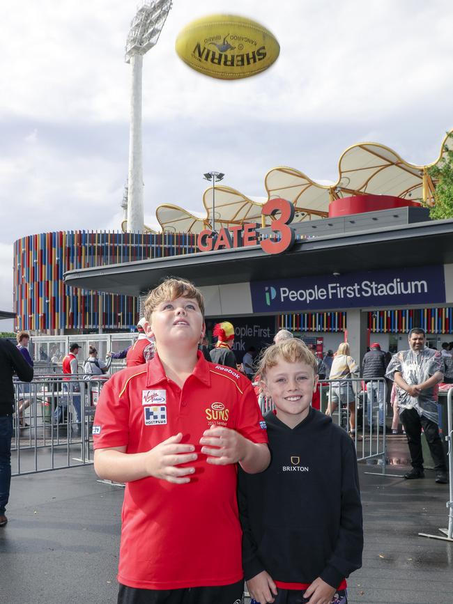 Zach and Seb Kelly before the Suns V Freo at People First Stadium Cararra. Picture: Glenn Campbell