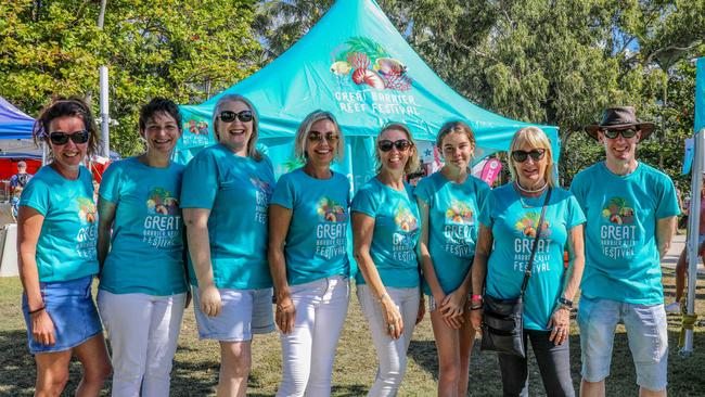 Members of a previous Great Barrier Reef Festival committee (from left) Lisa Stockow, Kirsten Orenshaw, Fiona Van Blarcom, Margie Murphy, Heather Batrick, Lily Tarver, Ellen Kerr and Brian Duell in 2021. Photo: Vampp Photography