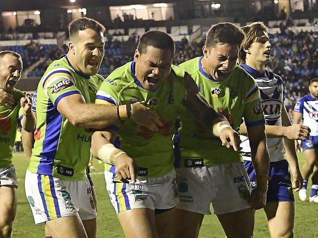 SYDNEY, AUSTRALIA - JULY 07:  Joseph Leilua of the Raiders celebrates scoring a try with team mates during the round 17 NRL match between the Canterbury Bulldogs and the Canberra Raiders at Belmore Sports Ground on July 7, 2018 in Sydney, Australia.  (Photo by Brett Hemmings/Getty Images)