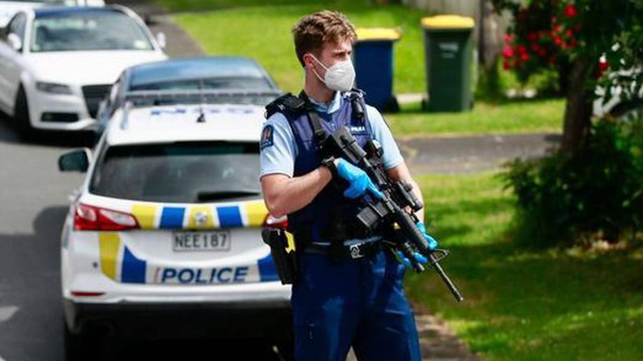 Armed police officers at the scene in Glen Eden. Picture: Alex Burton