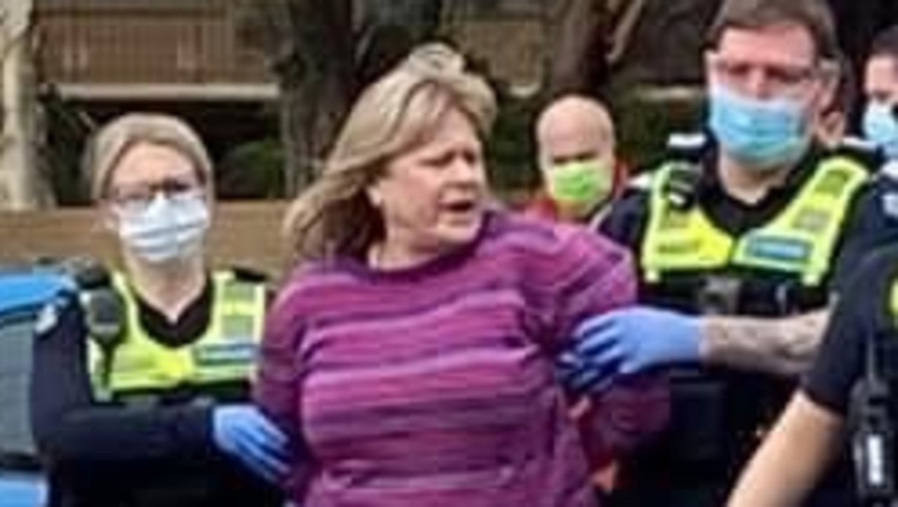 Mandy Crerar (centre) is alleged to have coughed and yelled at cafe staff after they refused to serve her for not wearing a mask.