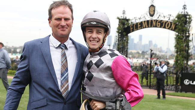 Surprise Baby jockey Jordan Childs and trainer Paul Preusker after winning The Bart Cummings and earning themselves a start in the Melbourne Cup. Picture: Michael Klein