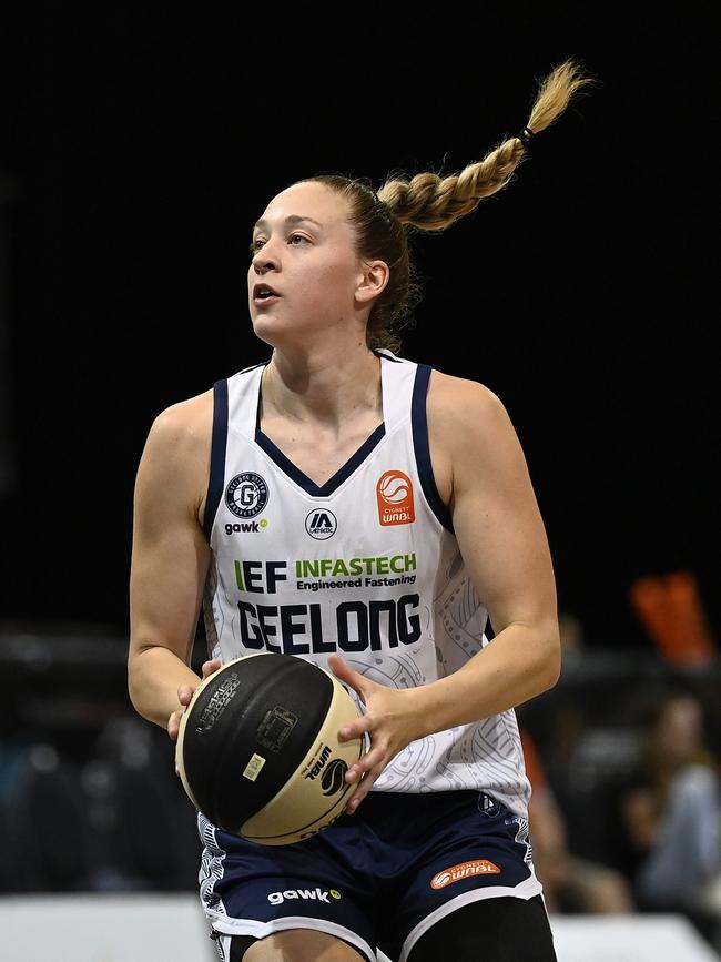 Alex Sharp warms up ahead of her second game for Geelong. Picture: Ian Hitchcock/Getty Images