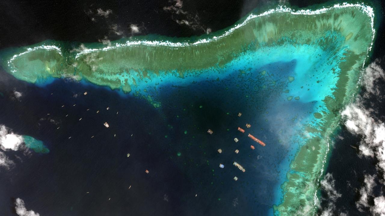 Chinese vessels anchored at the Whitsun Reef, around 320 kilometres west of Bataraza in Palawan in the South China Sea. Pictue: Maxar Technologies/AFP