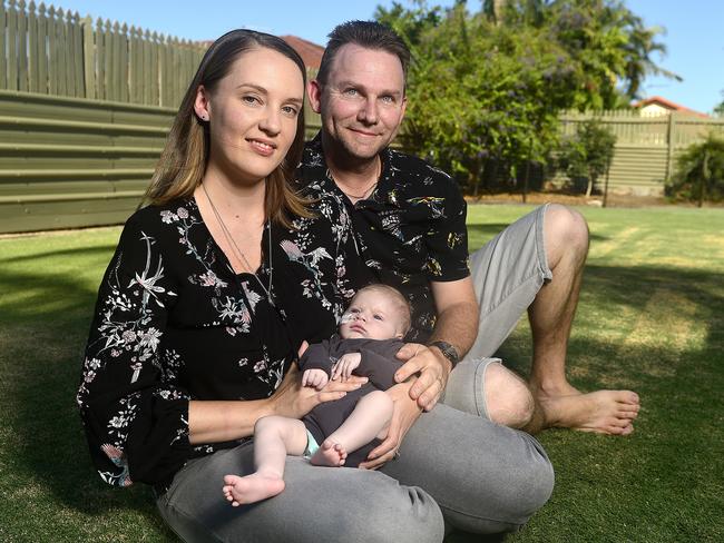 Parents Rhett and Shahn Trevarthen with baby William who was born with a hole in his heart and had open heart surgery at 2 weeks old. The family returned to Townsville from Brisbane 2 weeks ago. PICTURE: MATT TAYLOR.