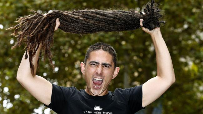 Dale Robinson holding his Dreadlocks which he has been growing for 18 years. Picture: John Appleyard