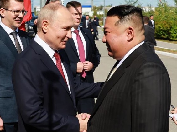 Vladimir Putin and Kim Jong-un shake hands as they meet in Tsiolkovsky. Picture: Supplied