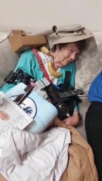 Grandma wakes up in surprise as family plays "Nana Buckaroo" while she's asleep