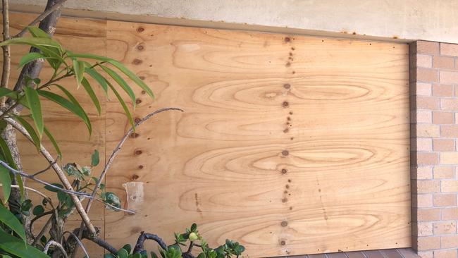 A boarded up window at the derelict Sea Life Aquarium at Manly. Picture: Jim O’Rourke