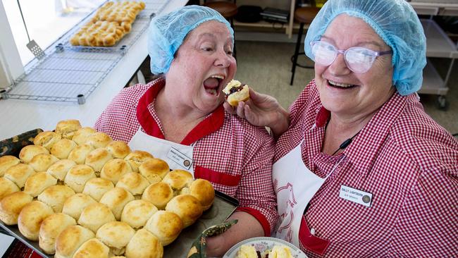 CWA ladies Bernadette McNamara from Edwardstown and Sally Lightburn from Murray Town in the Flinders Ranges celebrate baking the last batch of scones in the CWA kitchen during the Royal Show. Picture Mark Brake