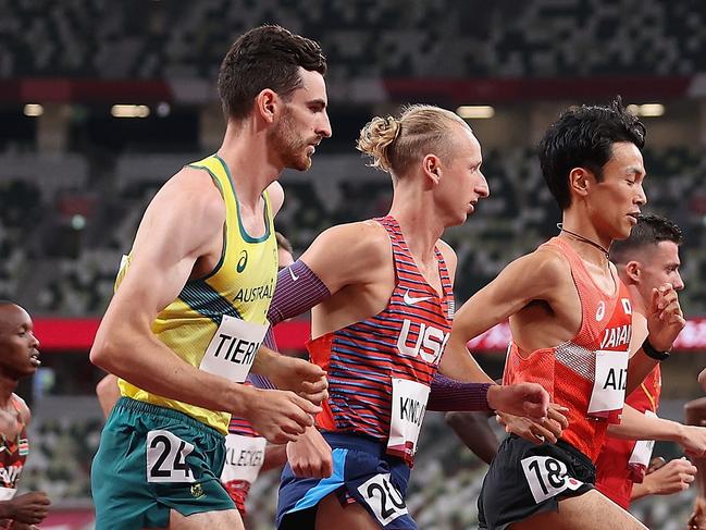 TOKYO, JAPAN - JULY 30: (L-R)  Patrick Tiernan of Team Australia, William Kincaid of Team USA and Akira Aizawa of Team Japan compete in the Men's 10,000m Final on day seven of the Tokyo 2020 Olympic Games at Olympic Stadium on July 30, 2021 in Tokyo, Japan. (Photo by Christian Petersen/Getty Images)