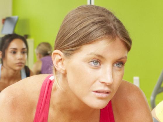 Women Taking Part In Gym Fitness Class