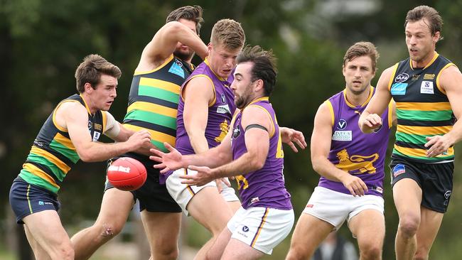 Collegians and St Kevin’s do battle in the VAFA. Picture: Hamish Blair