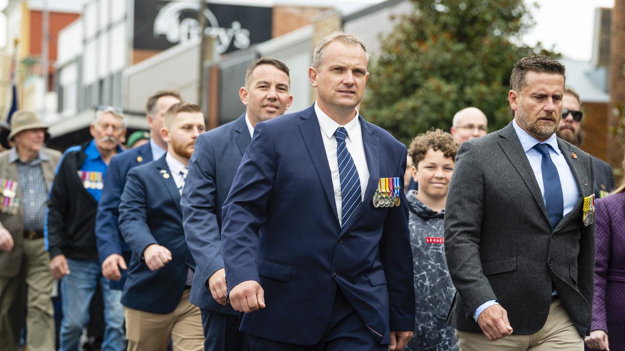 Toowoomba RSL sub branch president Scott May (front, centre) marching in the Anzac Day morning march, Monday, April 25, 2022. Picture: Kevin Farmer