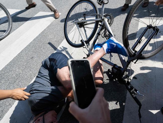 The 79-year-old took a nasty tumble as he greeted well-wishers. Picture: AFP