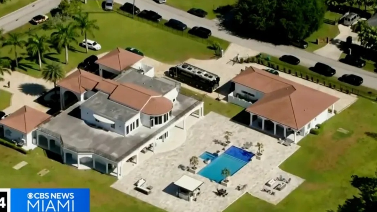 Police descended on the Florida mansion. Picture: CBS News
