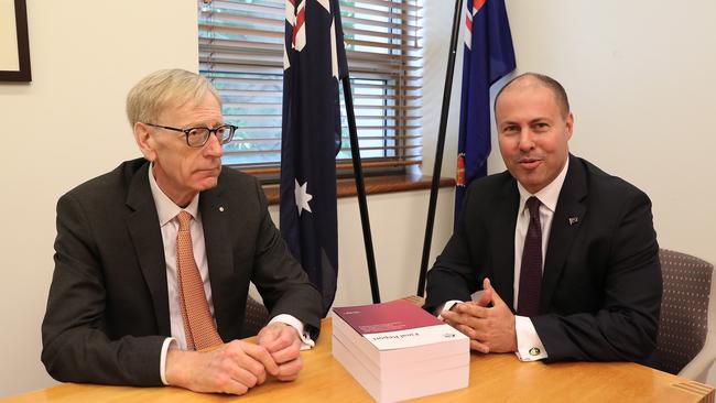 Commissioner Kenneth Hayne and the Treasurer with the final report, released today. Picture: Kym Smith