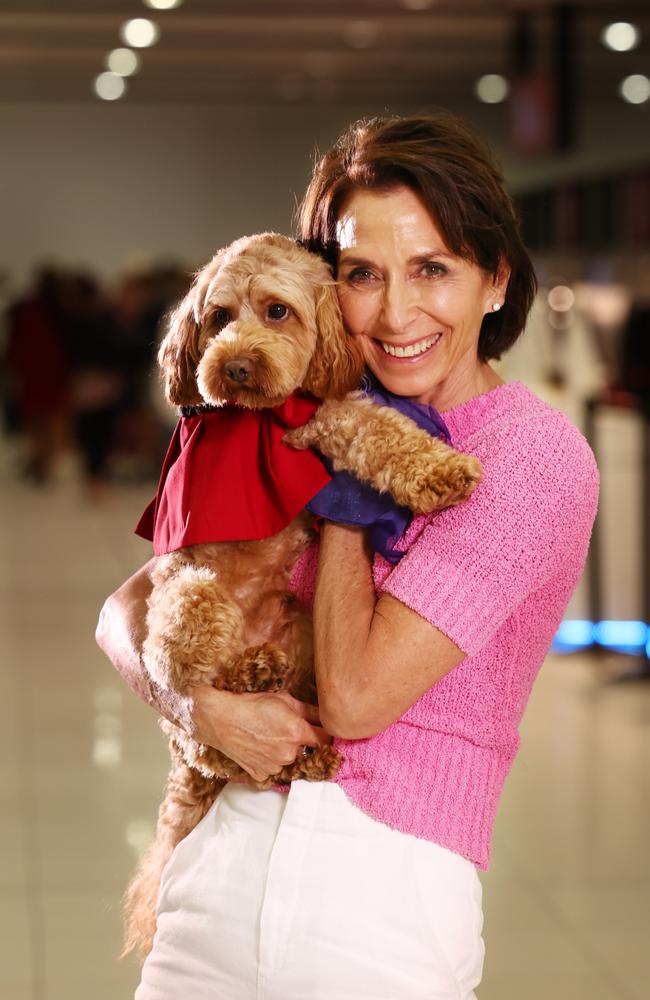 Virgin Australia Group CEO, Jayne Hrdlicka at Melbourne Airport, with a furry friend. Picture: Alex Coppel