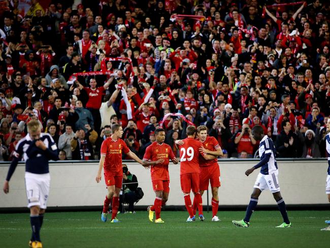 A packed MCG of Liverpool fans celebrate Steven Gerrard’s first half goal in 2013.