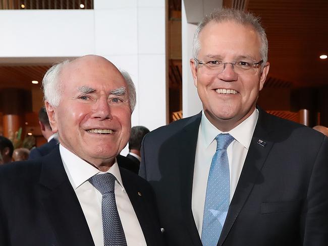 Former Prime Minister John Howard, Prime Minister Scott Morrison and Former Prime Minister Tony Abbott pose for photographs during an afternoon tea at the official opening of the 46th Federal Parliament,  at Parliament House in Canberra. Picture Kym Smith