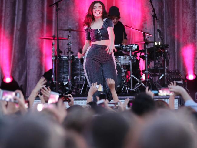 Lorde busts a move at the Sydney Opera House Forecourt. Picture: Christian Gilles