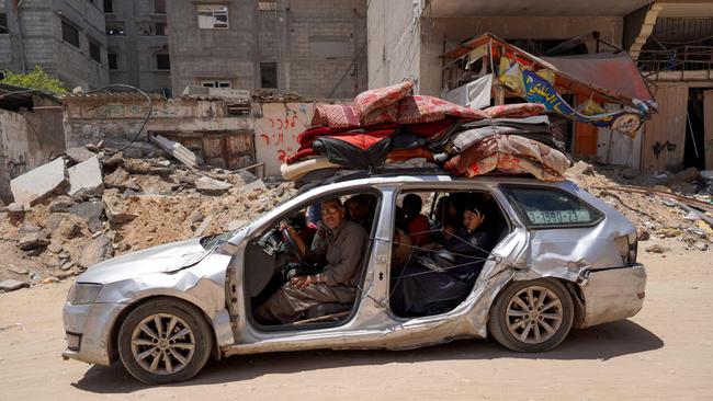 Displaced Palestinians arrive in Khan Younis on Thursday. Picture: AFP