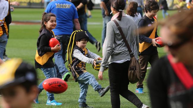 The AFL allowed fans on the ground to kick the footy before the Richmond-Melbourne game last week. Picture: Alex Coppel.