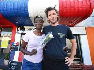 French couple Damien Pigot and Sandy Mendy outside their 3 Sea Cafe in happier times. Picture: Scott Powick