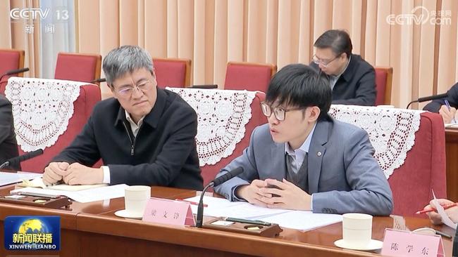 Liang Wenfeng (R), the founder of Chinese AI start-up DeepSeek, speaks at the symposium presided by Chinese Premier Li Qiang to hear opinions and suggestions on a draft government work report. Picture: CCTV.