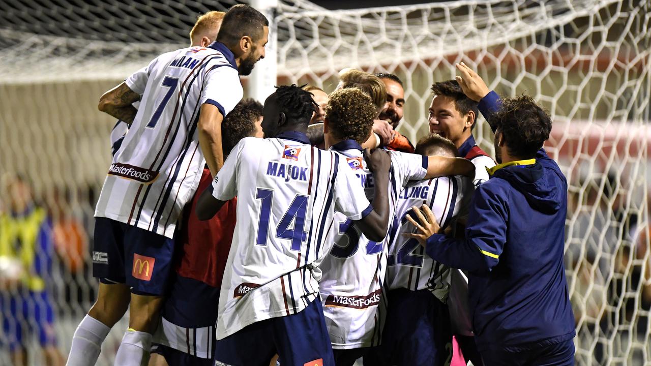 The Mariners celebrate their round of 16 FFA Cup win over Brisbane Roar. (Photo by Bradley Kanaris/Getty Images)