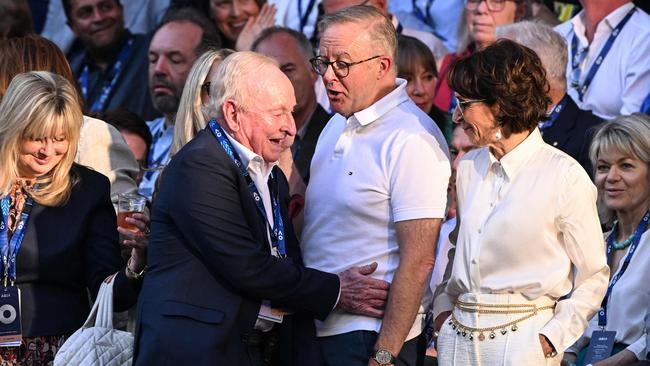 Laver greets the PM. Picture: William West/AFP