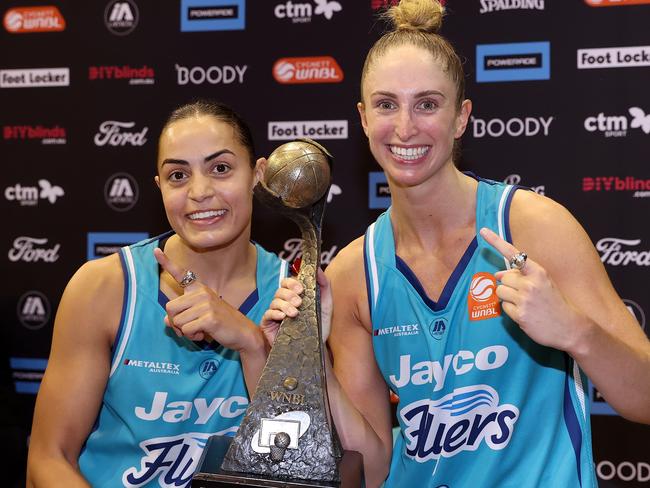 Southside Flyers duo Maddison Rocci and Rebecca Cole pose with the WNBL Championship. Picture: Getty Images