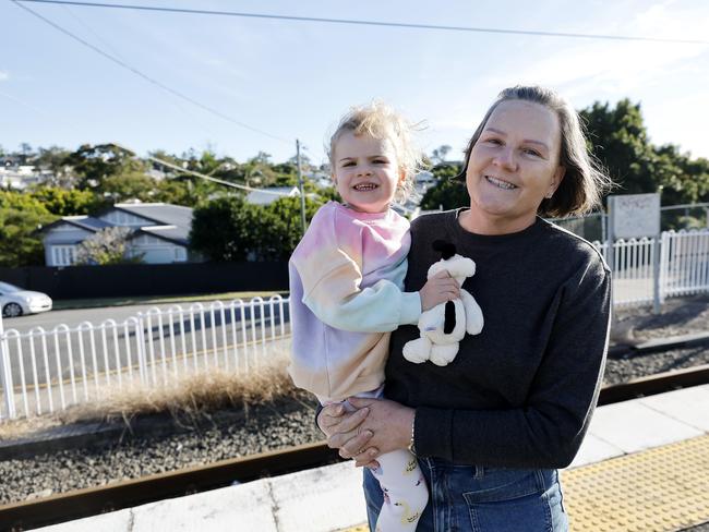 Commuters like Carol Hoareau and Matilda, 3, are major winners from the budget. Picture: Josh Woning