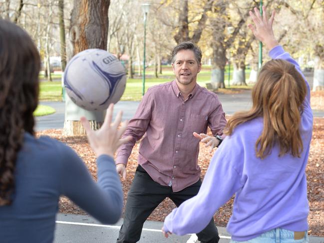 Reece hits the netball court with his daughters. Picture: Josie Hayden