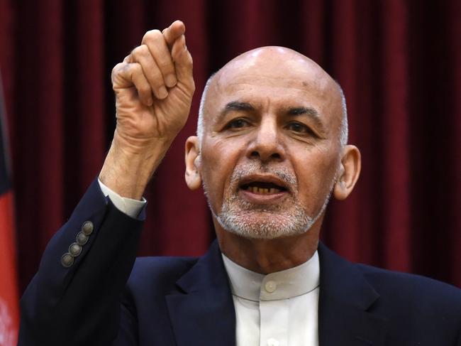 Afghan President Ashraf Ghani gestures as he speaks during a press conference at the presidential palace in Kabul on March 1, 2020. (Photo by WAKIL KOHSAR / AFP)