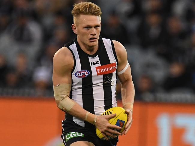 The gun midfielder’s absence would be a huge blow to the Pies’ premiership hopes. Picture: AAP