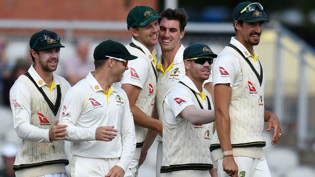 A tight-knit Australian team gather after Ben Stokes’s exit. Picture: AFP