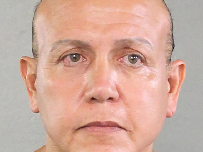 This handout mugshot obtained courtesy of the Broward County Sheriff'a Office shows an August 2015 booking photo of Cesar Sayoc, who the US media on October 26, 2018 identifies as the suspect in connection with 12 suspicious packages and pipe bombs sent to critics of US President Donald Trump. - US investigators have arrested the suspect in Florida in connection with 12 suspicious packages and pipe bombs sent to critics of Donald Trump in a days-long spree that has inflamed the United States ahead of key midterm elections. (Photo by HO / BROWARD COUNTY SHERIIF'S OFFICE / AFP) / == RESTRICTED TO EDITORIAL USE  / MANDATORY CREDIT:  "AFP PHOTO /  BROWARD COUNTY SHERIFF'S OFFICE" / NO MARKETING / NO ADVERTISING CAMPAIGNS /  DISTRIBUTED AS A SERVICE TO CLIENTS  ==