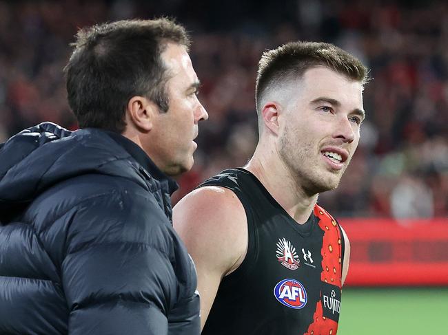 Brad Scott and Zach Merrett at the final siren. Picture: Mark Stewart