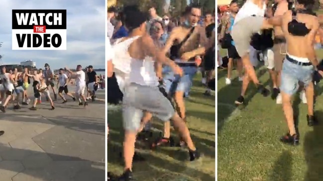 Maskless men brawl in St Kilda