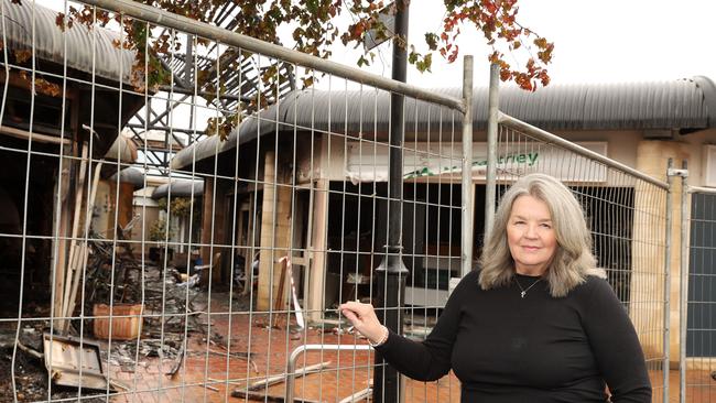 Silver and Sea owner Sabrina Kingsley outside the burnt remains of her Torquay shop. Picture: Alison Wynd